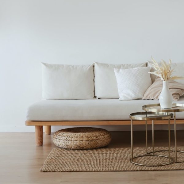 light colored couch in minimalist setting
